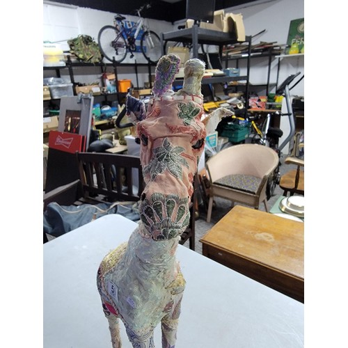 50 - Tall fabric covered giraffe in various sequin decorated material, stands at 67cm