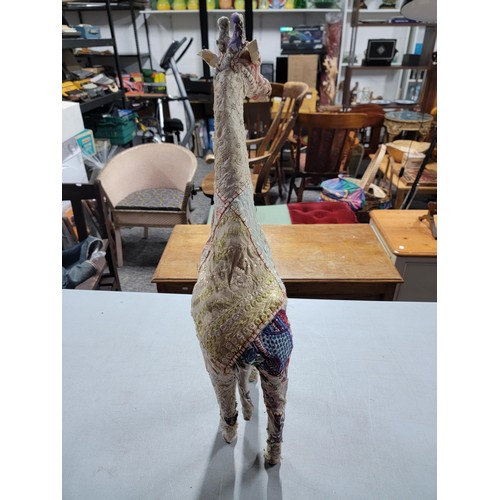 50 - Tall fabric covered giraffe in various sequin decorated material, stands at 67cm