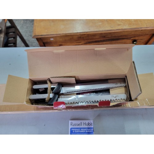 53 - Boxed as new satin chrome ball ended extendable curtain pole along with a boxed Marco Pierre electri... 