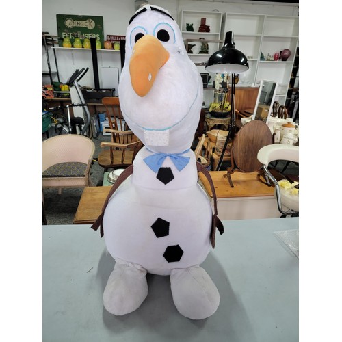 57 - An oversized Olaf off Frozen soft toy in good order measures 102cm high, 50cm wide.