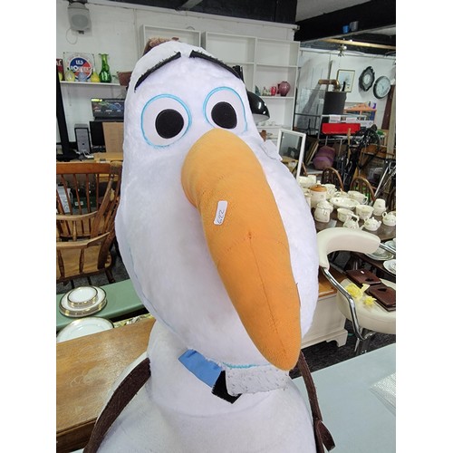 57 - An oversized Olaf off Frozen soft toy in good order measures 102cm high, 50cm wide.