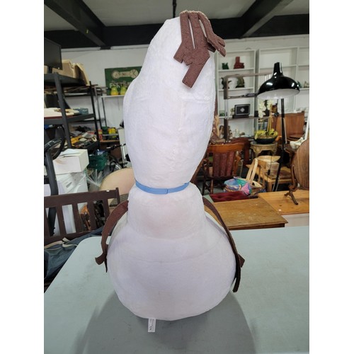 57 - An oversized Olaf off Frozen soft toy in good order measures 102cm high, 50cm wide.