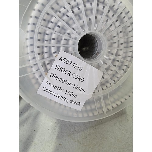 82 - Large quantity of shock cord black and white approx 100m in length with a 10mm diameter