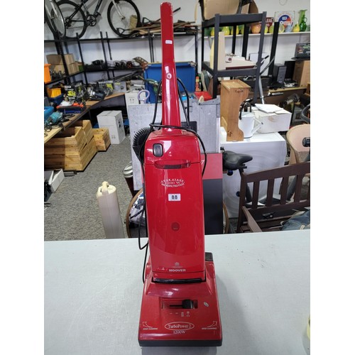 88 - 4 stage 1200w micro filtration turbo powered 2 upright bag Hoover with edge cleaner, no bag present.