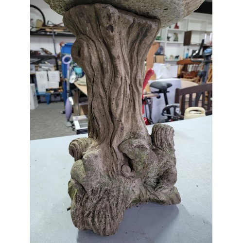 94 - Concrete bird bath with squirrels on a tree stump design to the base in overall good condition heigh... 