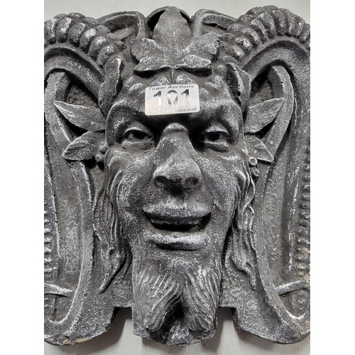 101 - Concrete devils head wall plaque in black, in good order 30cm high 28cm width