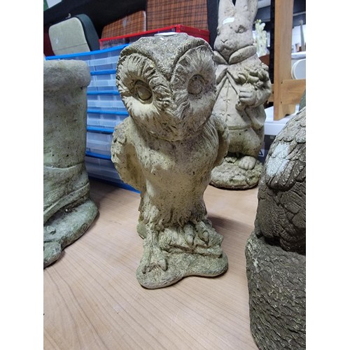 103 - Quantity of stoneware animals inc 2x owls along with a hedgehog in good order largest measures 30cm ... 