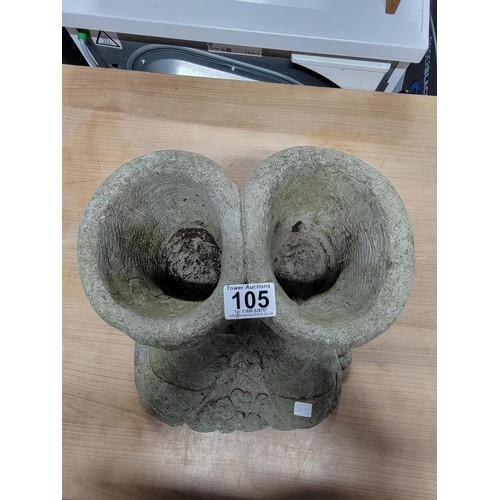 105 - Pair of concrete boot planters with a vine design between them in good order height 31cm base diamet... 