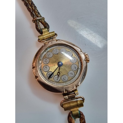 493 - Hallmarked 9ct yellow gold cased vintage watch along with one other watch with a rolled gold strap b... 