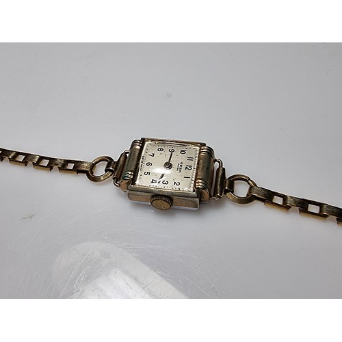 493 - Hallmarked 9ct yellow gold cased vintage watch along with one other watch with a rolled gold strap b... 