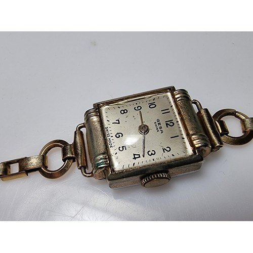 493 - Hallmarked 9ct yellow gold cased vintage watch along with one other watch with a rolled gold strap b... 