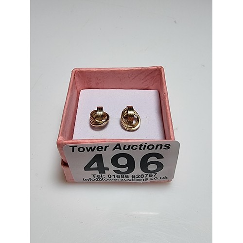 496 - Pair of 9ct yellow gold stud earrings with an ornate twist design in good clean boxed condition weig... 