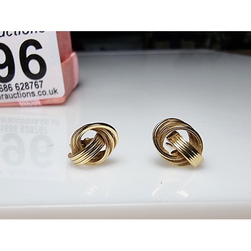 496 - Pair of 9ct yellow gold stud earrings with an ornate twist design in good clean boxed condition weig... 