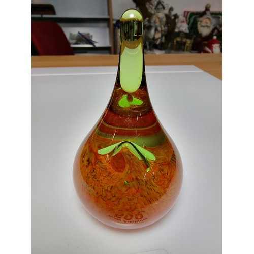 500 - Pretty art glass moon drop paper weight by Caithness featuring an orange swirl and bubble design wit... 