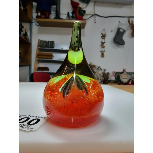 500 - Pretty art glass moon drop paper weight by Caithness featuring an orange swirl and bubble design wit... 