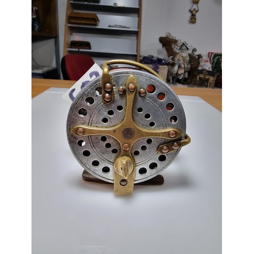 502 - Good quality antique star back fishing reel of hardwood with brass in great clean condition displays... 