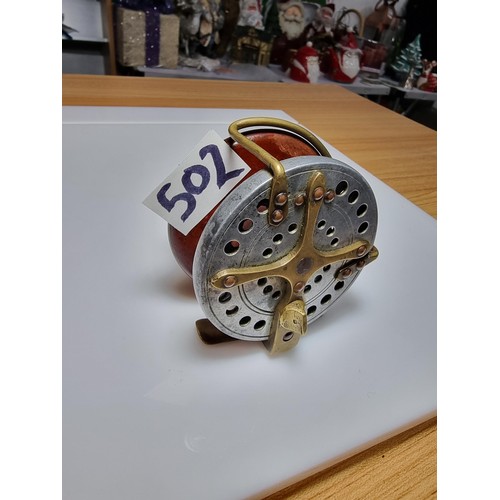 502 - Good quality antique star back fishing reel of hardwood with brass in great clean condition displays... 