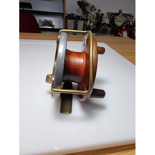 502 - Good quality antique star back fishing reel of hardwood with brass in great clean condition displays... 