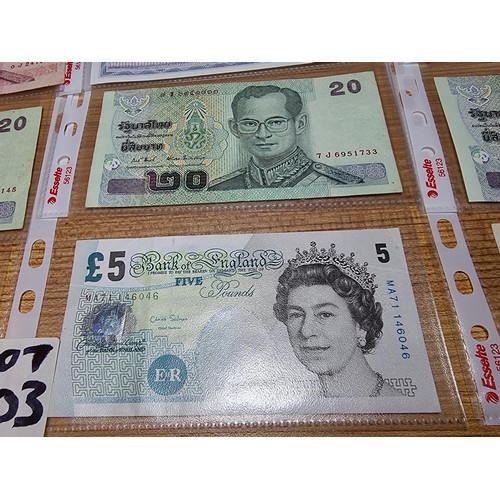 503 - Large collection of various world bank notes , a British £1 & £5 notes and other notes relating to B... 