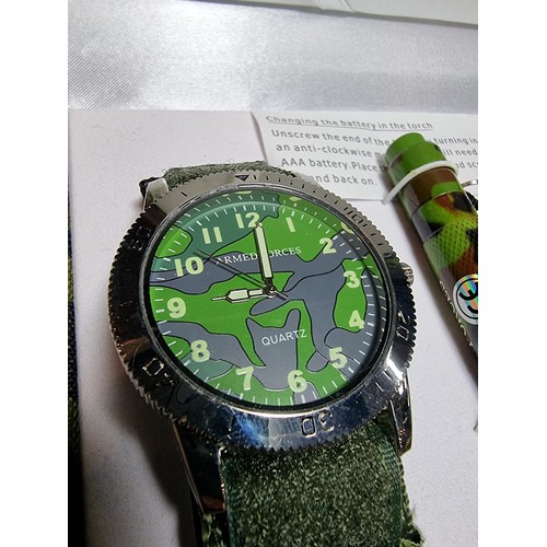 504A - Armed forces cased gift set to inc. a watch, torch, pen & wallet in unused condition would be a grea... 