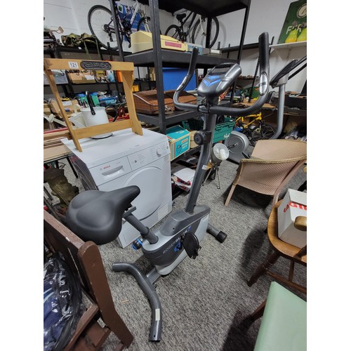 198 - Roger black exercise bike in working order with fully working digital screen has a tension control, ... 