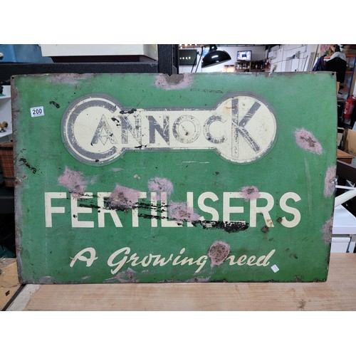 200 - Vintage single sided enamel green and white sign reads Cannock Fertilersers A Growing Need, has hole... 