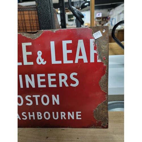 201 - Vintage red and white enamel sign reads De Ville & Lear Engineers Roston Nr Ashbourne, in overall go... 