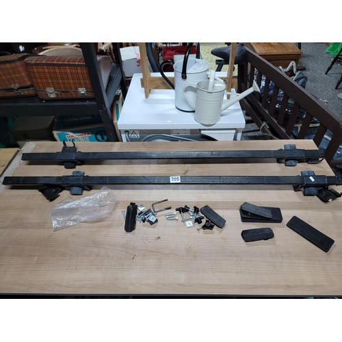 205 - Pair of universal roof rails along with attachments in good order rails have a length of 126cm