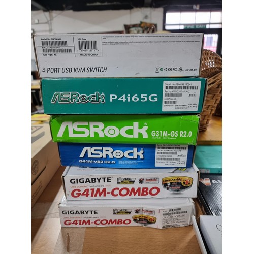 1 - A collection of boxed new old stock PC accessories to include a quantity of boxed mother boards with... 