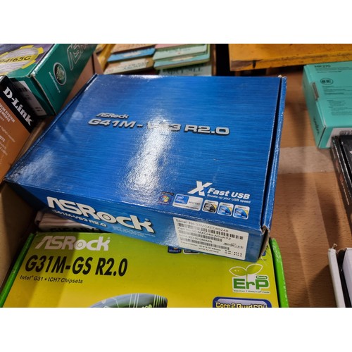 1 - A collection of boxed new old stock PC accessories to include a quantity of boxed mother boards with... 