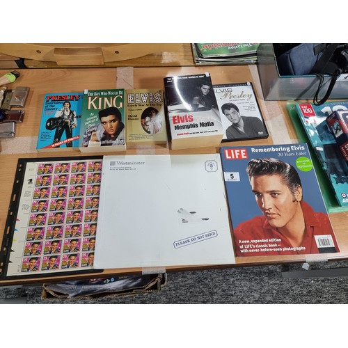 5 - A lot relating to Elvis to include 4 books, a DVD, A full sheet of Elvis stamps and a LIFE magazine.