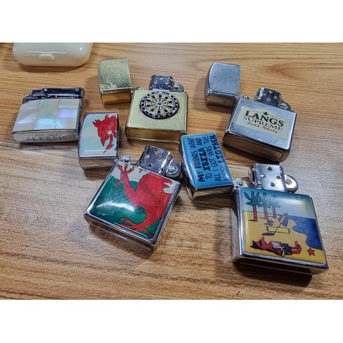 6 - A collection of 6 vintage lighters to include a new old stock Silk Cut cased lighter with its origin... 