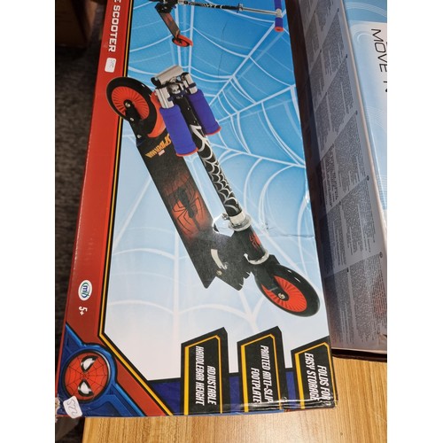 10 - A boxed Spiderman folding scooter along with a boxed EVO light up move and groove child's scooter, b... 