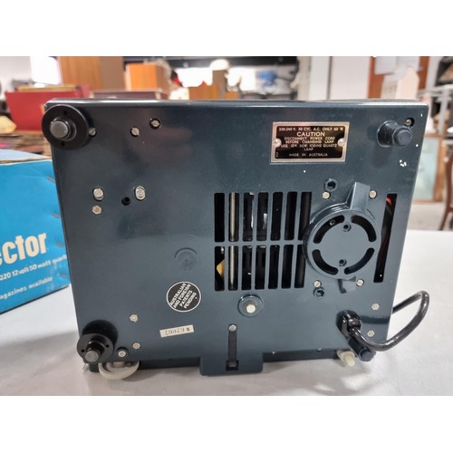 15 - A very clean vintage Boots IQ semi automatic projector, looks to have had little or no use, complete... 