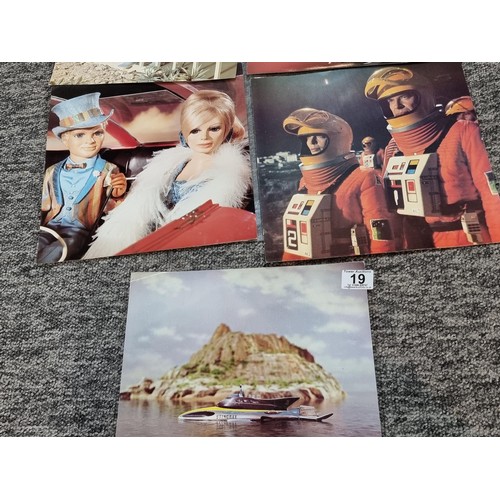 19 - A collection of 5x large vintage photographs relating to Thunderbirds along with a Dinky toys Lady P... 