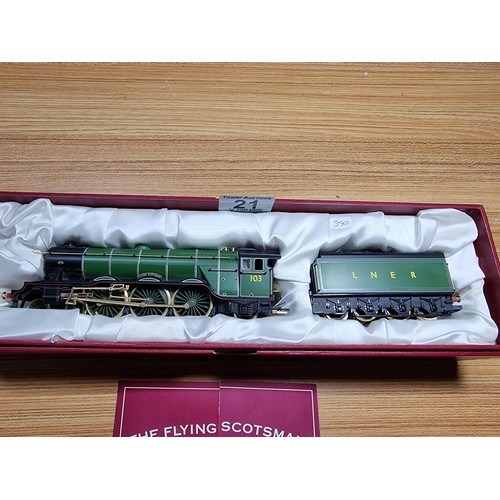 21 - A very rare Hornby R2146 Millenia limited edition gold plated Flying Scotsman locomotive and tender.... 