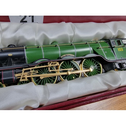 21 - A very rare Hornby R2146 Millenia limited edition gold plated Flying Scotsman locomotive and tender.... 