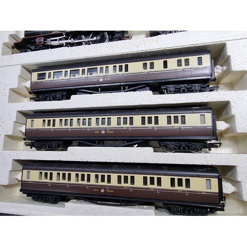 41 - A boxed Hornby R2084 Great British train pack to include King Charles II locomotive, 3 coaches, with... 