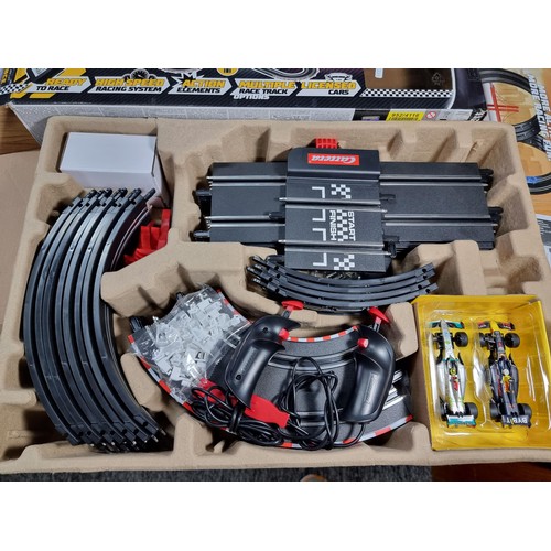 44 - A boxed as new Carrera go Formula 1 slot car racing set with a Mercedes and Red Bull F1 cars, never ... 