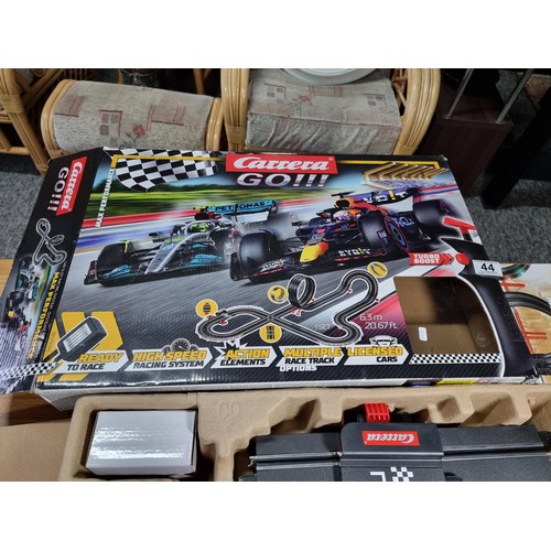 44 - A boxed as new Carrera go Formula 1 slot car racing set with a Mercedes and Red Bull F1 cars, never ... 