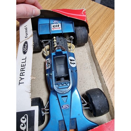 46 - 4x rare vintage model cars to include a boxed Schuco Tyrell Ford Formular1 car, a Marx toys sparklin... 