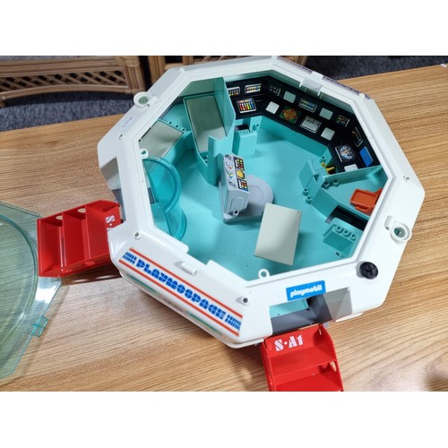 48 - A Playmobil Playmospace space station along with a large quantity of original playmobile figures and... 