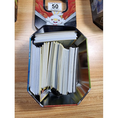 50 - A large quantity of approx 300 Pokémon cards fitted in a metal Pokémon tin along with 4 other empty ... 