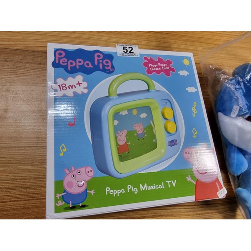 52 - A brand new and boxed Peppa Pig musical TV along with a new old stock Baby Shark Puppet with sounds.