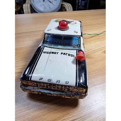 53 - A very rare early vintage Japanese tin plate remote control highway patrol police car (Ford) by Aosh... 