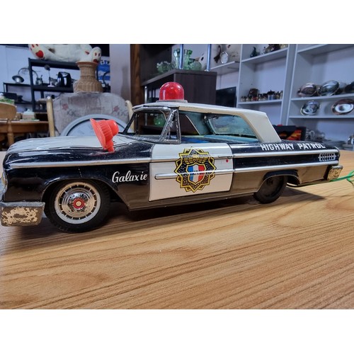 53 - A very rare early vintage Japanese tin plate remote control highway patrol police car (Ford) by Aosh... 