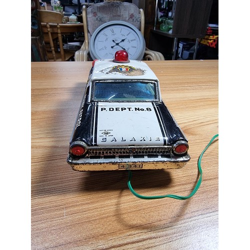 53 - A very rare early vintage Japanese tin plate remote control highway patrol police car (Ford) by Aosh... 