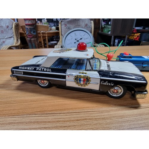 53 - A very rare early vintage Japanese tin plate remote control highway patrol police car (Ford) by Aosh... 