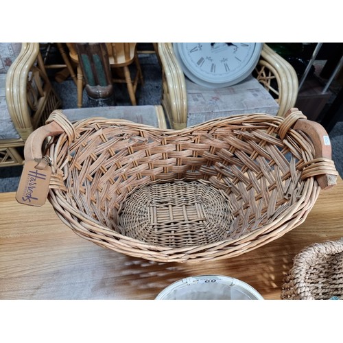 60 - A collection of 4 wicker baskets and a wicker bird house, a  good Harrod's wicker basket and 3 other... 