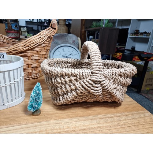 60 - A collection of 4 wicker baskets and a wicker bird house, a  good Harrod's wicker basket and 3 other... 